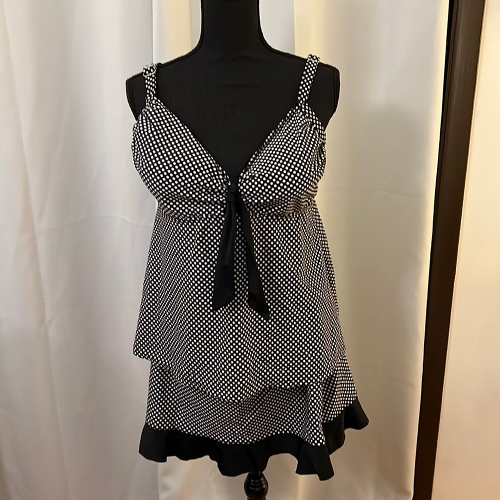 Catherine’s black and white tankini bathing suit